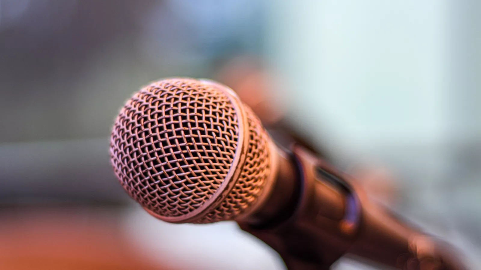 close-up photo of a microphone in a stand