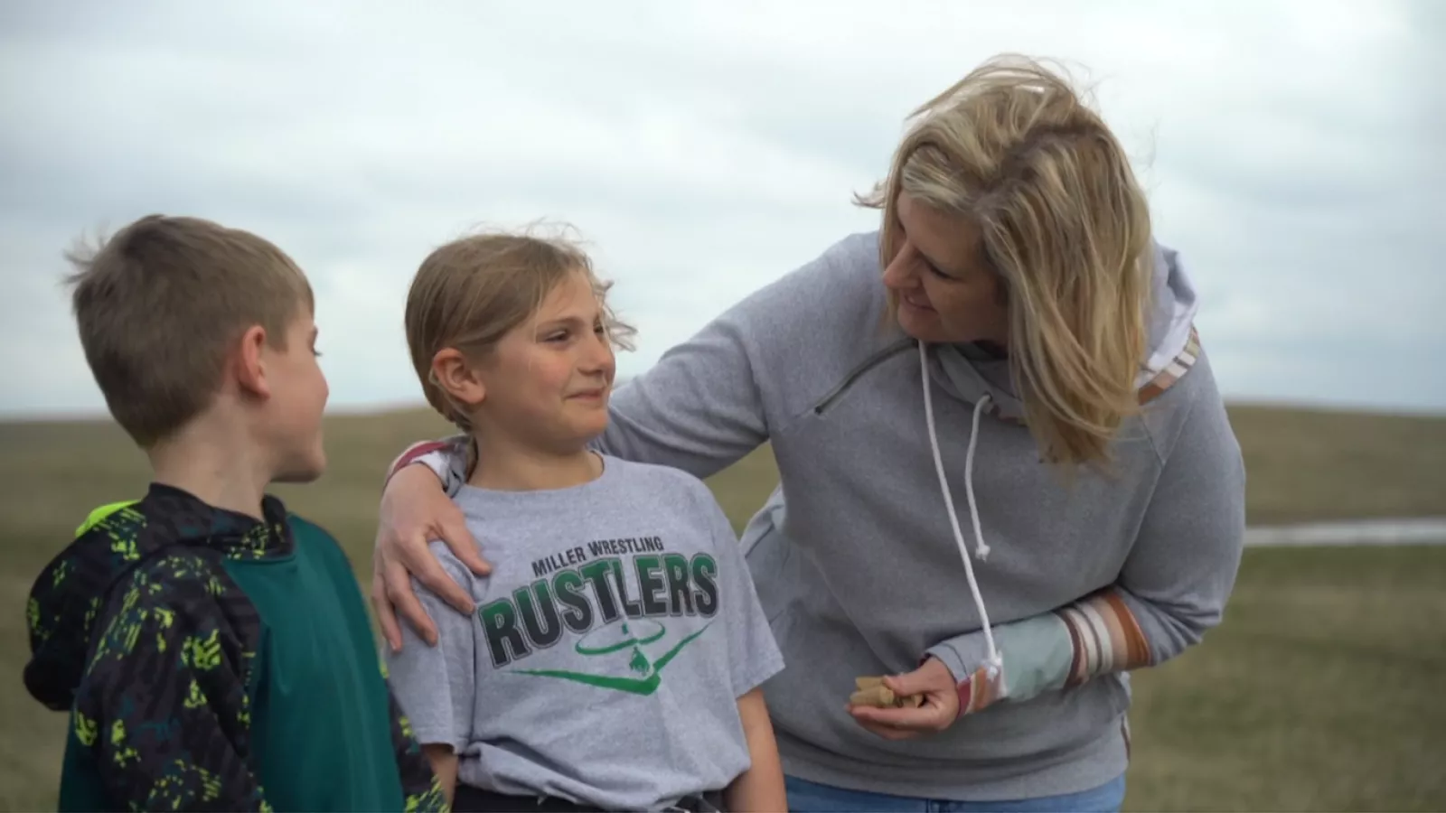 Teacher encouraging children